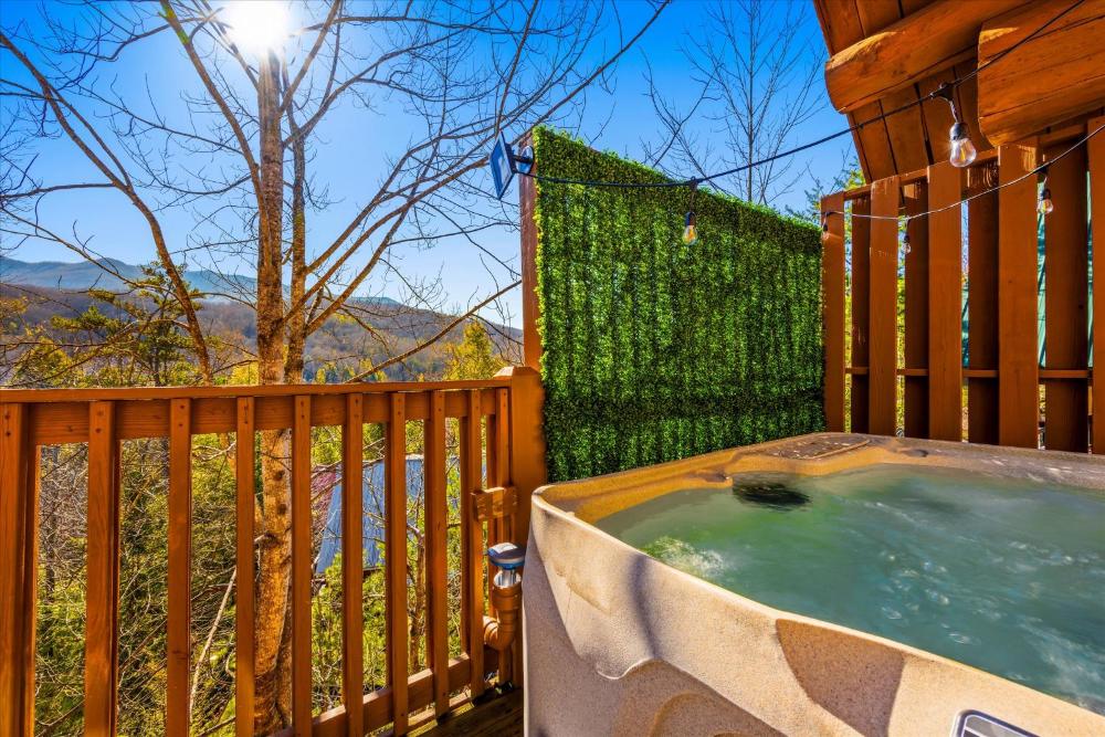 SmokiesBoutiqueCabins would love to host you! 4 miles to Gatlinburg Strip! Resort Pool open May 1 through Oct 1! Views, Shuffleboard, Hot Tub, Arcade!